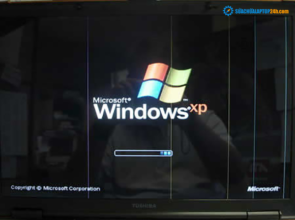 Laptop has few hair-like vertical lines in different colors